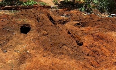 Polcia Militar localiza cadver enterrado em quintal de residncia e prende trs pessoas em gua Boa