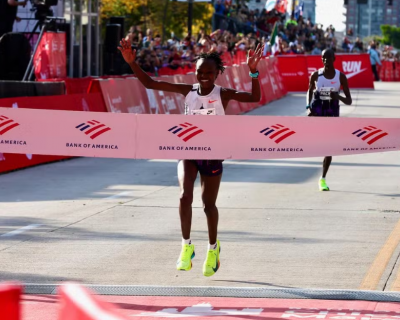 Queniana bate recorde mundial da maratona e  a primeira mulher a correr abaixo de 2h10min