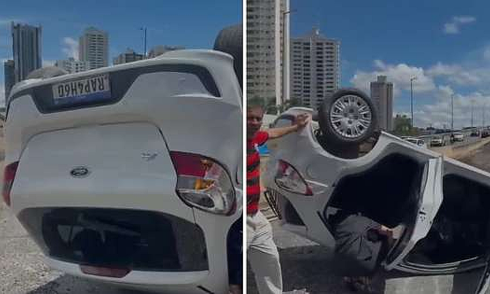 Carro de aplicativo capota em trincheira de avenida e deixa passageira ferida em Cuiabá (Vídeo)