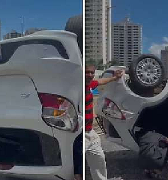 Carro de aplicativo capota em trincheira de avenida e deixa passageira ferida em Cuiabá (Vídeo)