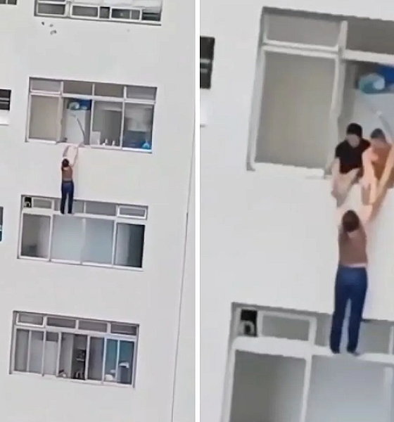 Mulher é resgatada por moradores após escorregar e quase cair de prédio em SP