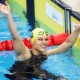 Carol Santiago conquista o tricampeonato mundial nos 100m costas em Singapura