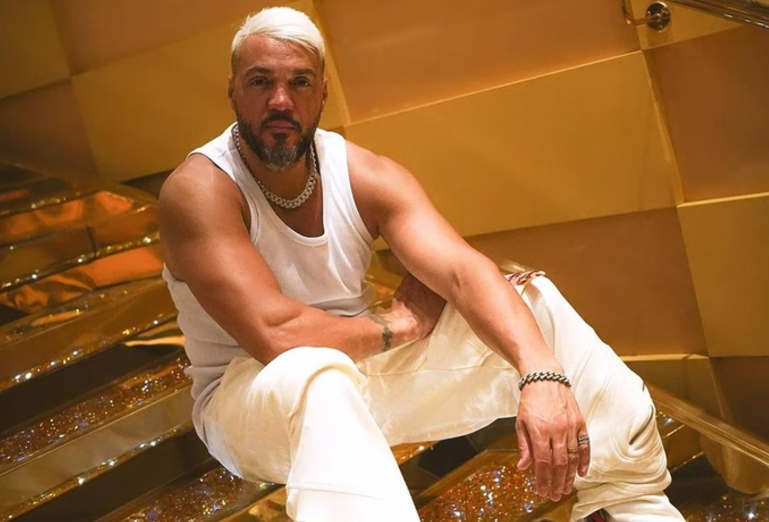 Amigo de Belo afirma que cantor tentou comprar fuzil de traficantes