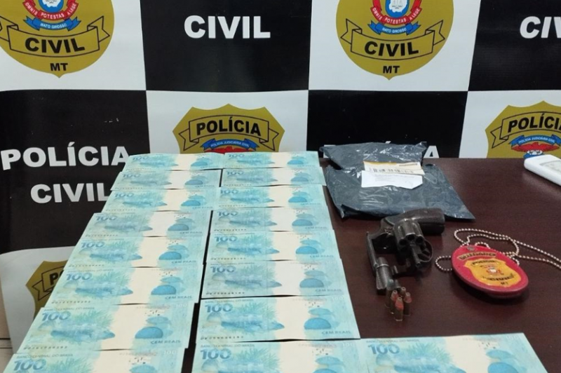 Homem � preso com notas falsas e arma em opera��o da Pol�cia Civil e PF em MT